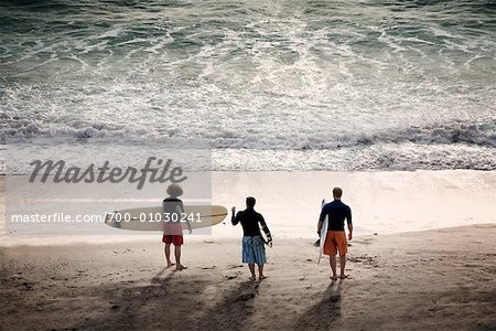 Surfers Standing at Shore, La Jolla, California, USA
