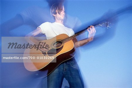 Man Playing Guitar