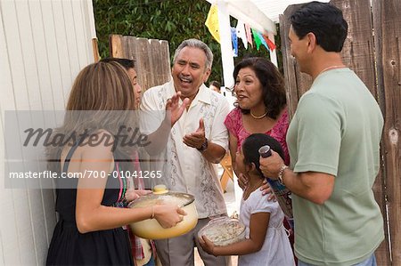 Family being Greeted at Family Gathering