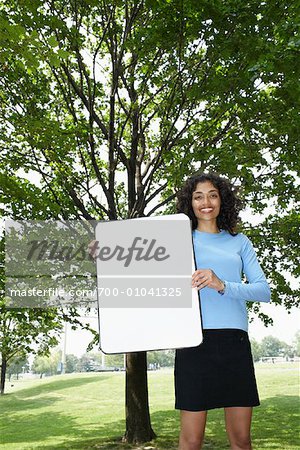 Woman Holding Sign
