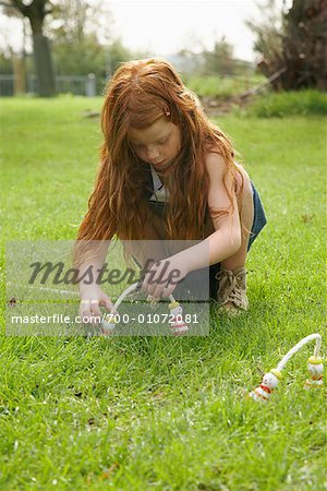 Girl Playing Outdoors