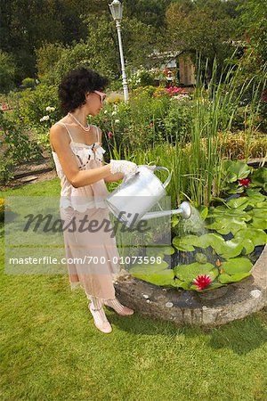 Woman Gardening in Formal Wear