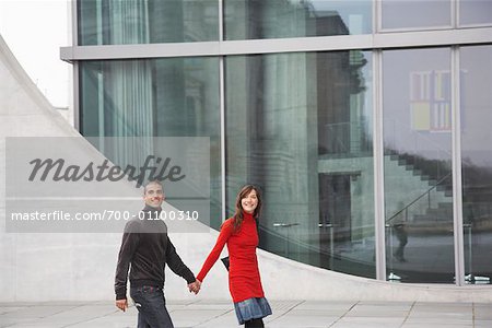 Couple Walking Outside of Marie Elisabeth Luders Haus, Berlin, Germany