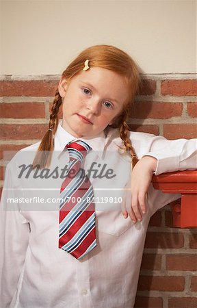 Portrait of Girl Wearing School Uniform - Stock Photo - Masterfile