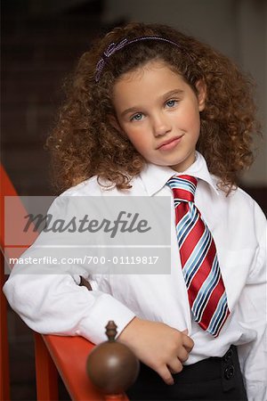 Portrait of Girl Wearing School Uniform - Stock Photo - Masterfile