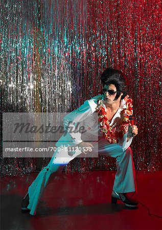 Elvis Impersonator on Stage