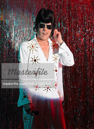 Elvis Impersonator on Stage