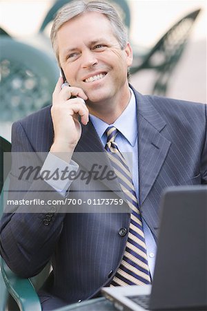 Portrait of Businessman with Laptop