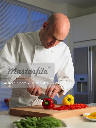 Chef Slicing Peppers