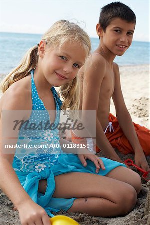 Playful boys enjoying the beach together, Stock Photo, Picture And Royalty  Free Image. Pic. BIM-BLD083548