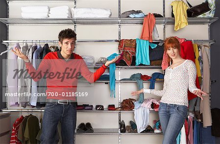 Portrait of Couple in Front of Closet