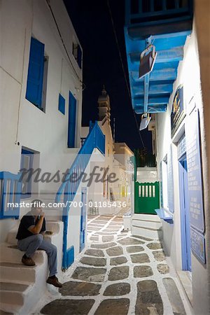 Man Sitting on Steps, Mykonos Town, Mykonos, Greece
