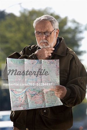 Man Looking at Map