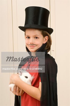 Boy Dressed as Magician, Holding Rabbit