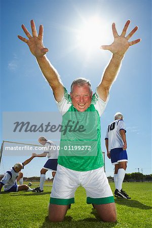 Soccer Player Cheering After Scoring Goal