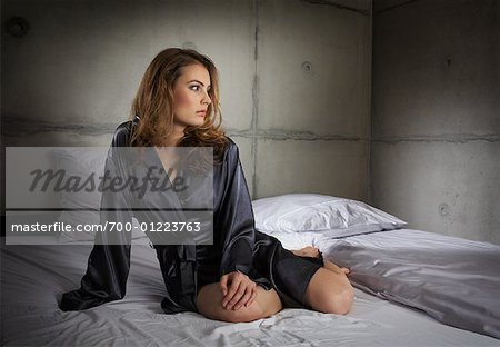 Portrait of Woman in Bedroom