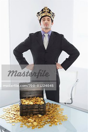 Businessman with Chest of Gold