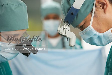 Doctors Performing Surgery