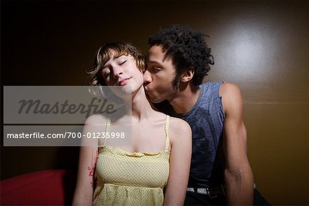 Couple Kissing on Couch