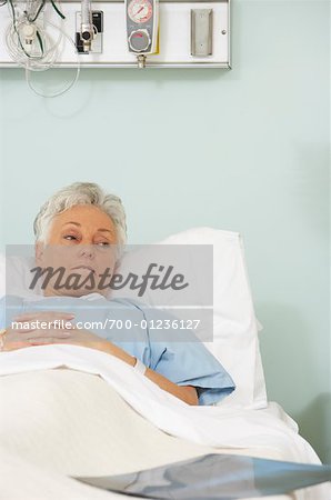 Woman in Hospital Bed