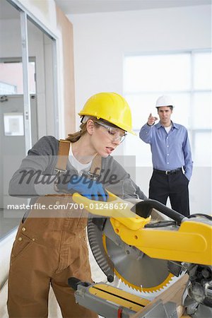 Man and Woman on Construction Site