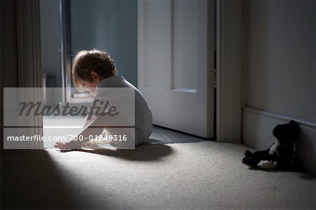 Baby Sitting by Doorway