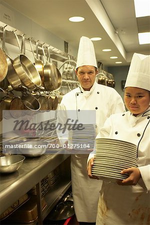 Chefs Carrying Plates