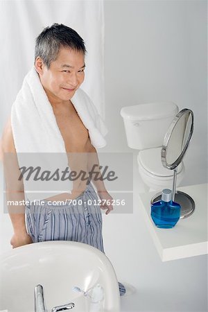 Portrait of Man in Bathroom