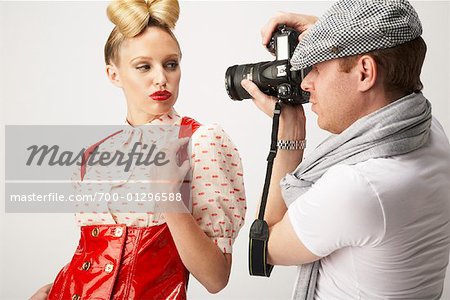 Photographer Taking Pictures of Model