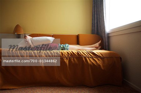 Girl Lying on Bed