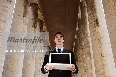 Businessman with Laptop Computer