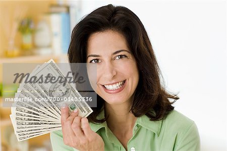 Portrait of Woman Holding Money