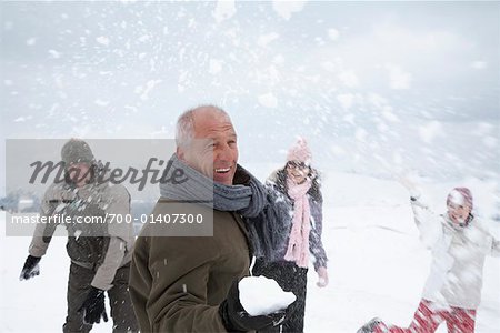 People Having Snowball Fight