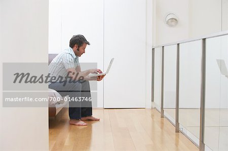 Man Using Laptop Computer