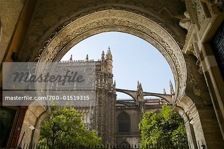 View of Cathedral Through Puerta del Perdon, Seville, Spain