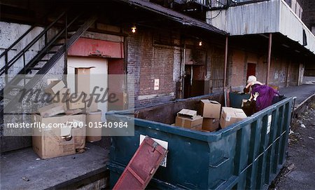 Couple in Formal Wear Climbing Out of Dumpster