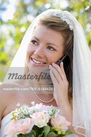 Bride Talking on Cell Phone