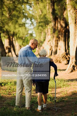Elderly Woman and Son Taking a Walk