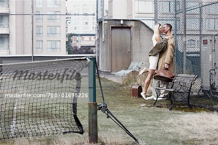 Couple on Tennis Court