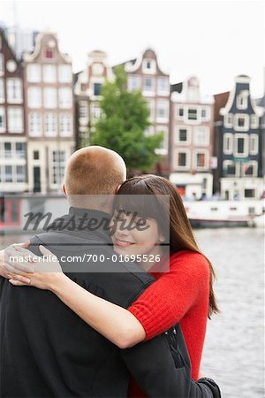 Couple by Canal, Amsterdam, Netherlands