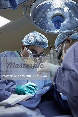 Doctors Performing Open Heart Surgery