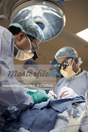 Doctors Performing Open Heart Surgery