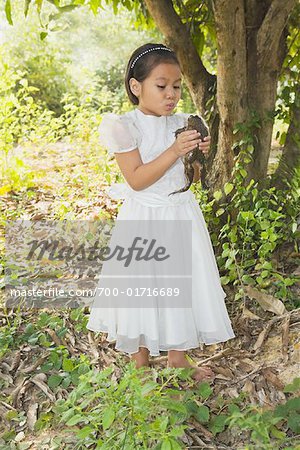 Girl Holding Frog