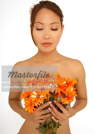 Portrait of Woman Holding Flowers