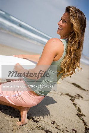 Woman Waxing Surfboard, Trestles Beach, San Clemente, Orange County, California, USA