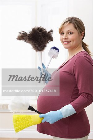 Pregnant Woman Doing Housework