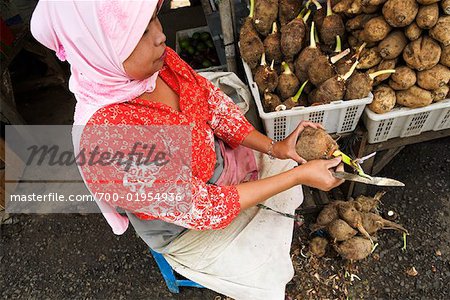 Woman Preparing Taro Root at, Market, Central Java, Java, Indonesia
