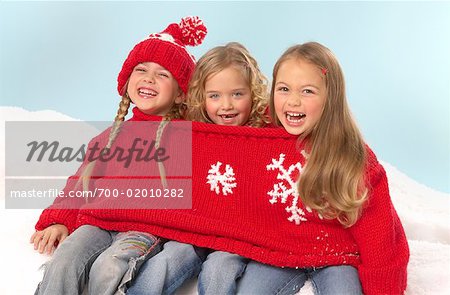 Three Girls Wearing One Sweater