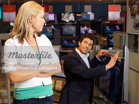 Couple with Television in Store