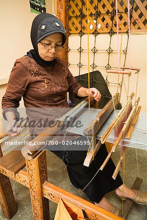 Woman Working at Loom, Pandai Sikat, Sumatra, Indonesia